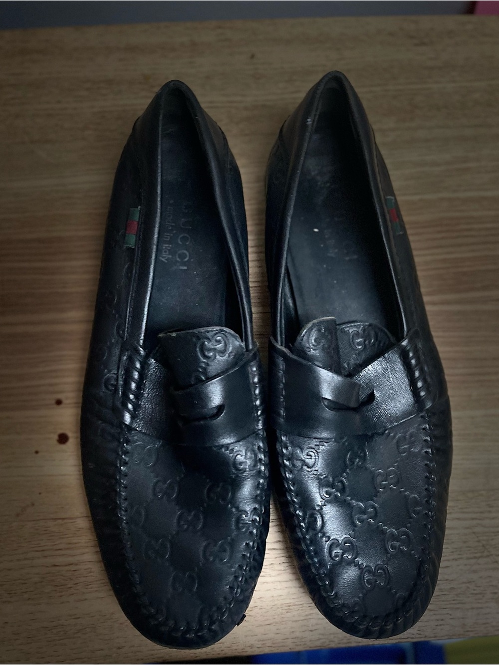 Gucci Black Embossed Slip-on Penny Loafers